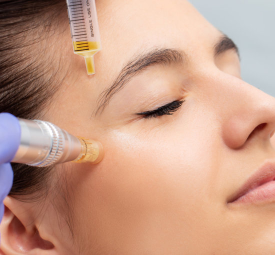 Macro close up of therapist injecting enzymes