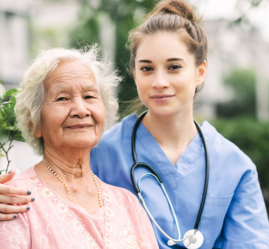 elderly woman and beautiful woman smile