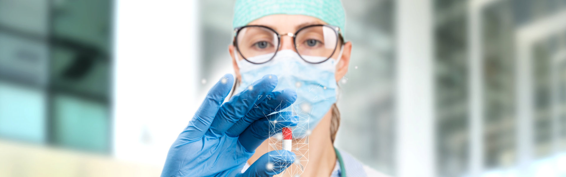 Scientist doctor holding a red and white pill with futuristic virtual low poly drawing.